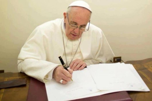 Pope-Francis-writing-740x493
